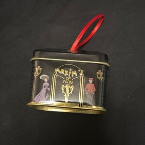 Maxim's de Paris Decorative Tin with Red Ribbon
